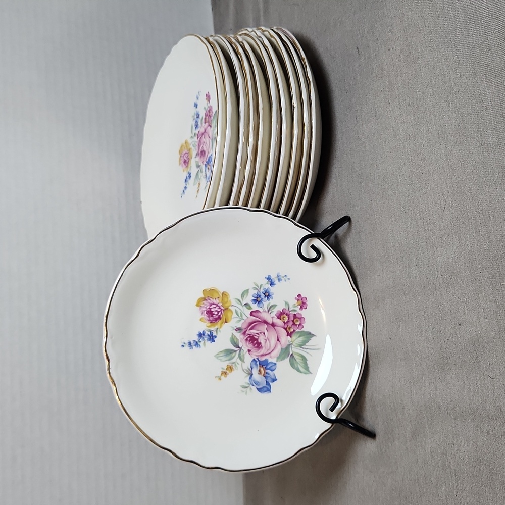 Set of 11 SCIO Pottery Hazel Saucers. Floral Design w/Gold Trim.